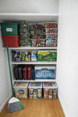 a picture of a book shelf with furniture