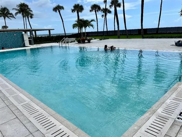 a view of outdoor space with swimming pool