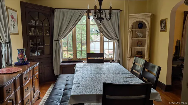 a view of a living room and dining room