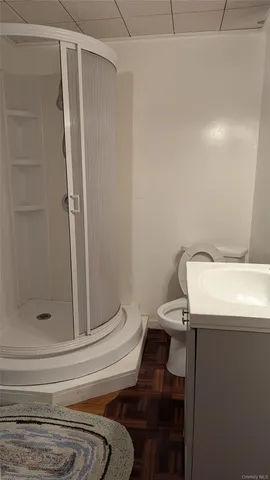 a bathroom with a sink and toilet