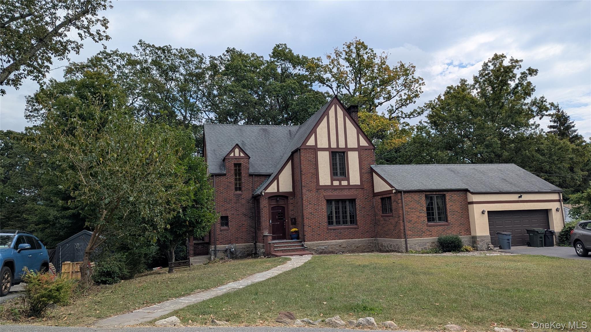 78 Roe Avenue Highland Falls, NY 10928 - Photo 36 of 41 a view of a yard in front of a house with large tree