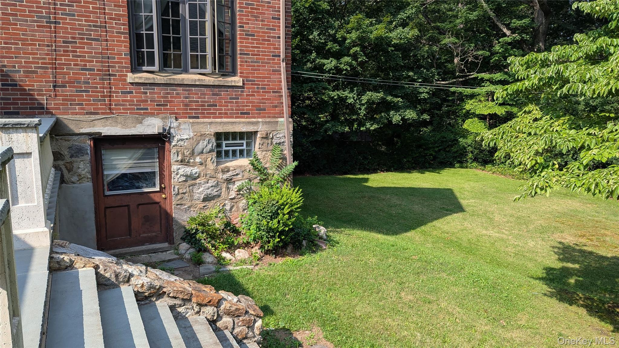 78 Roe Avenue Highland Falls, NY 10928 - Photo 5 of 41 a front view of a house with garden