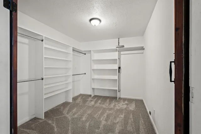 a view of a livingroom with a ceiling fan