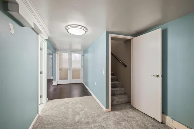 a view of a livingroom with a staircase