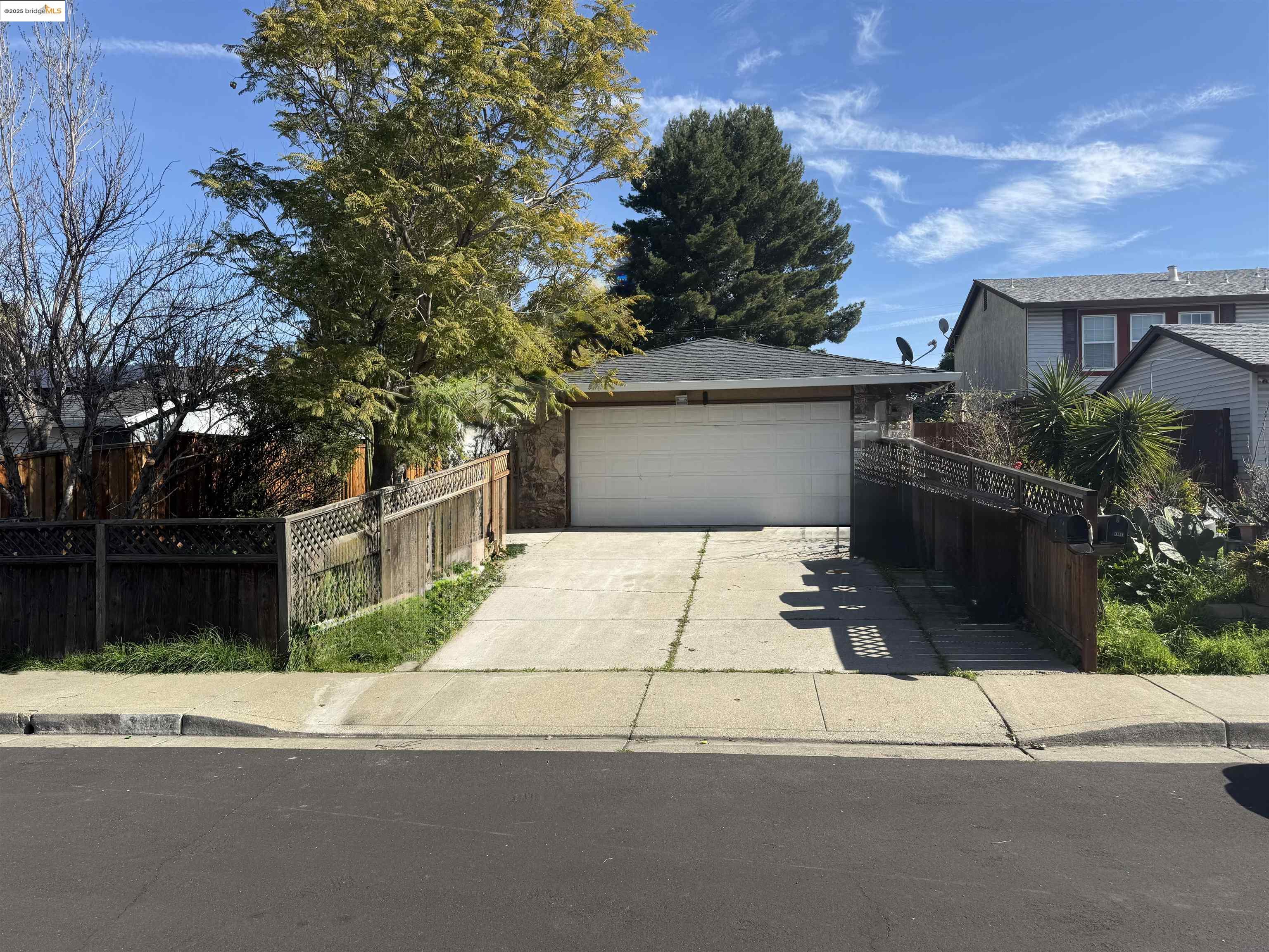 3044 Winterbrook Drive Bay Point, CA 94565 - Photo 1 of 18 a white house with a tree in front of it
