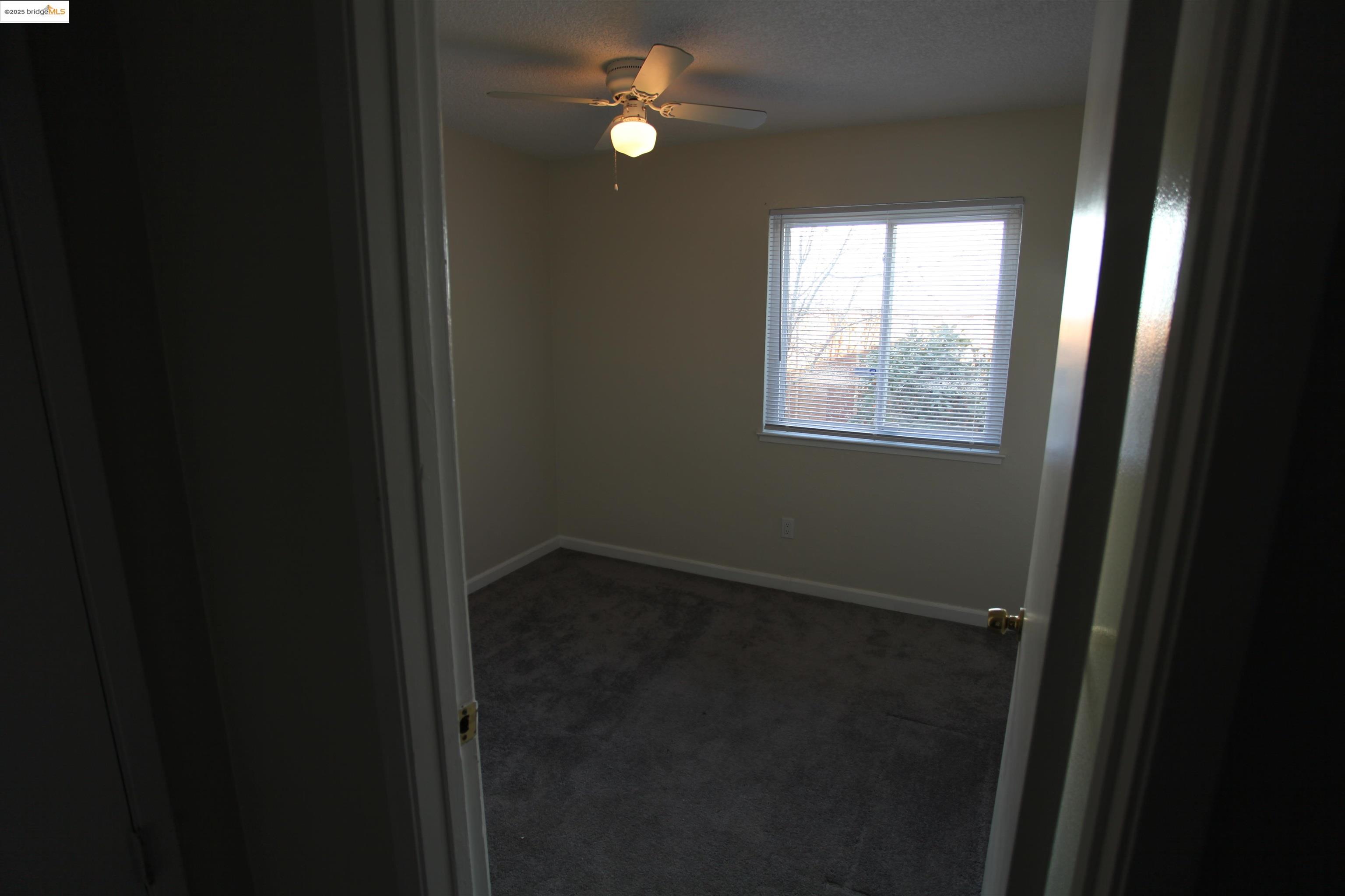3044 Winterbrook Drive Bay Point, CA 94565 - Photo 16 of 18 a view of an empty room with windows and closet