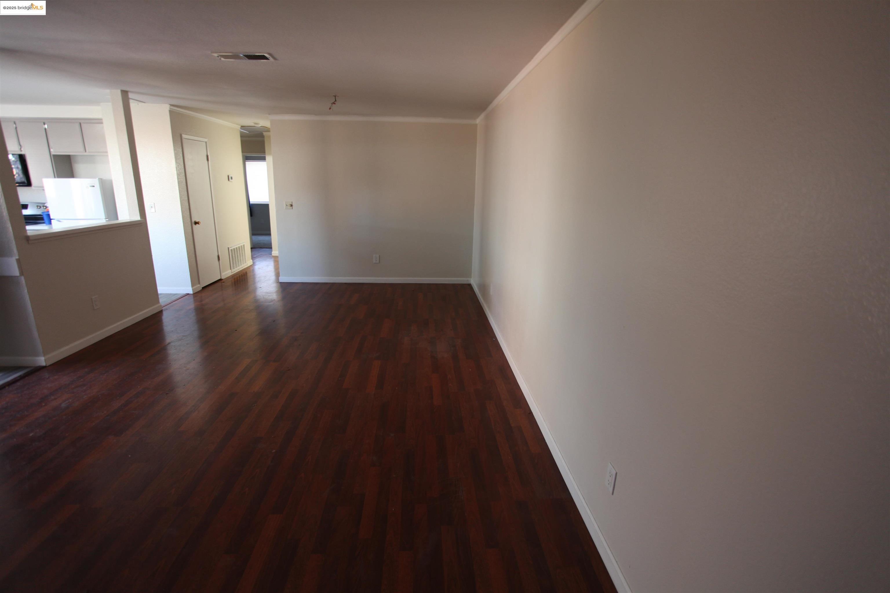 3044 Winterbrook Drive Bay Point, CA 94565 - Photo 9 of 18 a view of a hallway with wooden floor