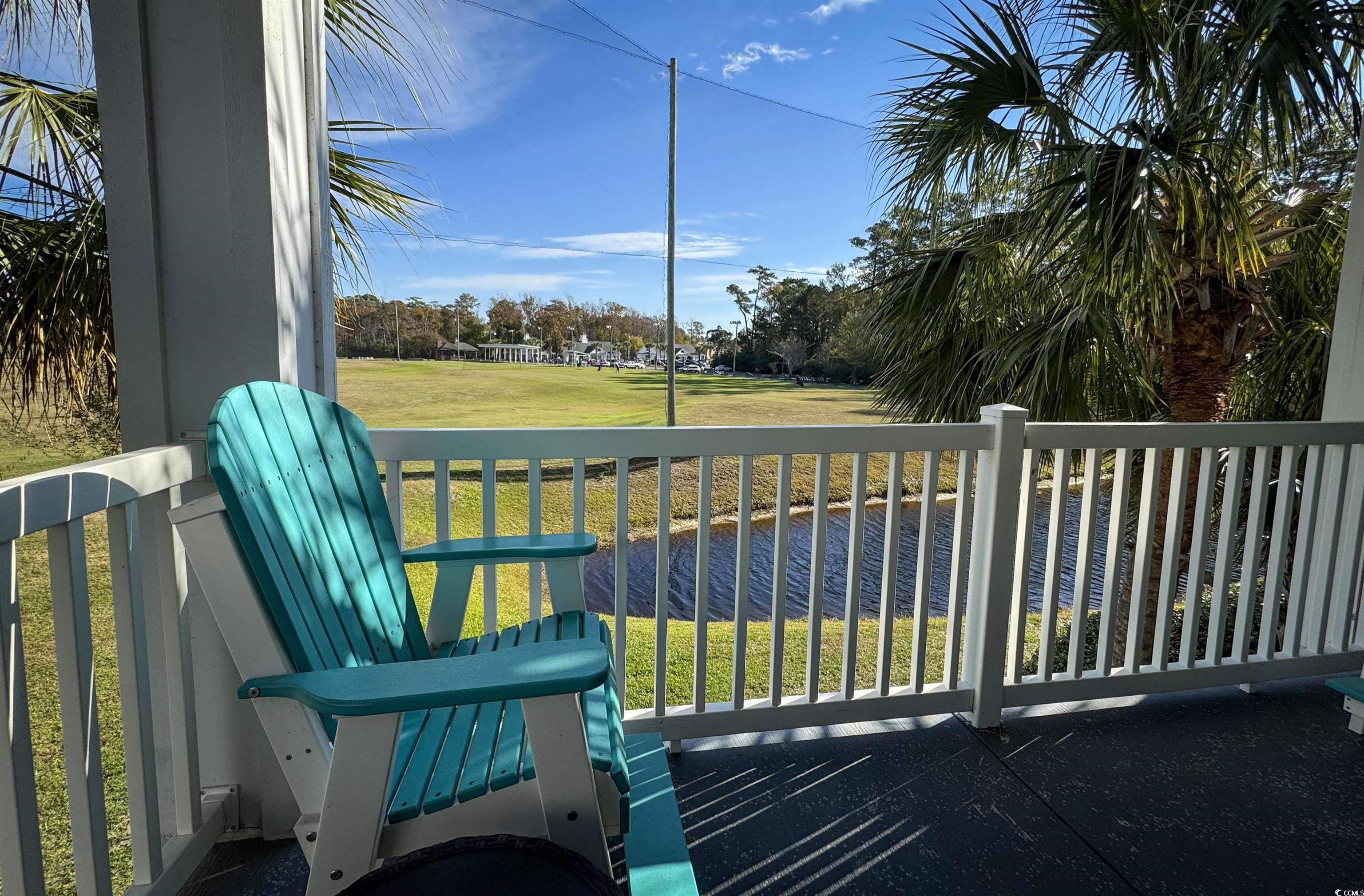1004 Ray Costin Way, Unit 206 Murrells Inlet, SC 29576 - Photo 19 of 29 Spacious balcony with a view of the driving range