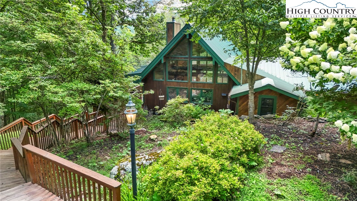 770 Grady Winkler Road Boone, NC 28607 - Photo 2 of 44 a front view of a house with garden