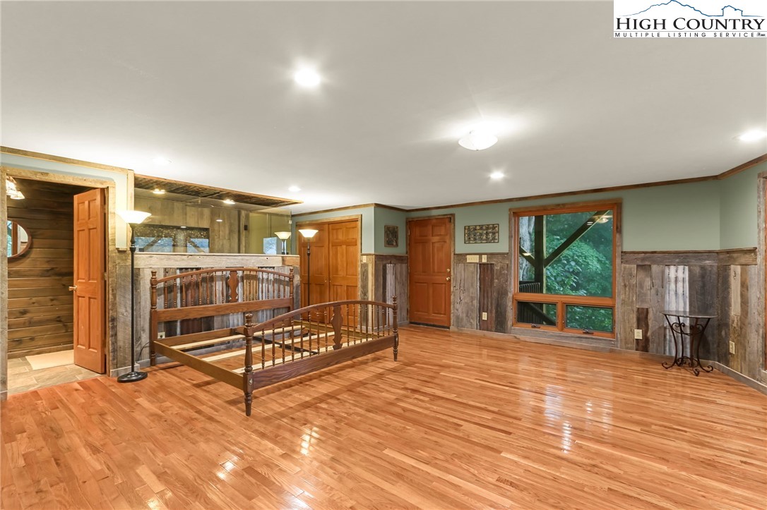 770 Grady Winkler Road Boone, NC 28607 - Photo 24 of 44 a view of a livingroom with furniture and a ceiling fan