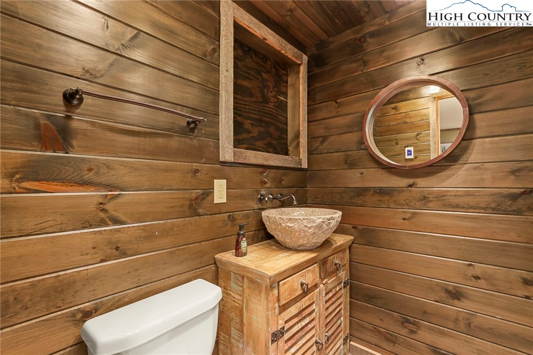 770 Grady Winkler Road Boone, NC 28607 - Photo 30 of 44 a bathroom with a toilet and a sink