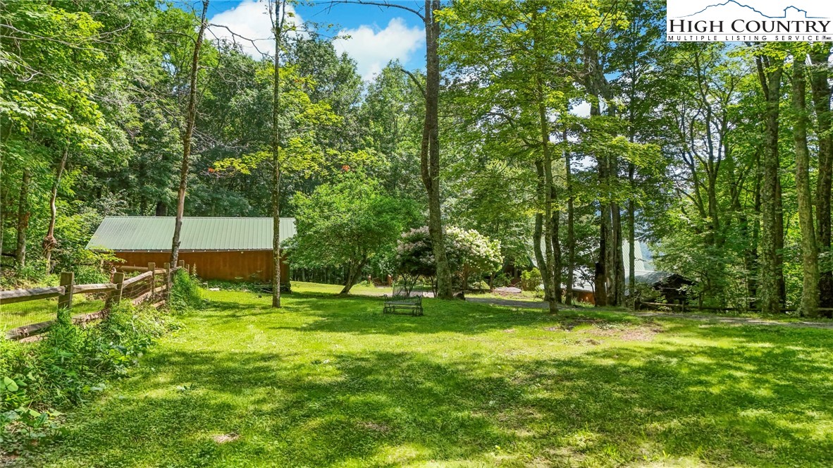770 Grady Winkler Road Boone, NC 28607 - Photo 41 of 44 a view of outdoor space with deck and yard