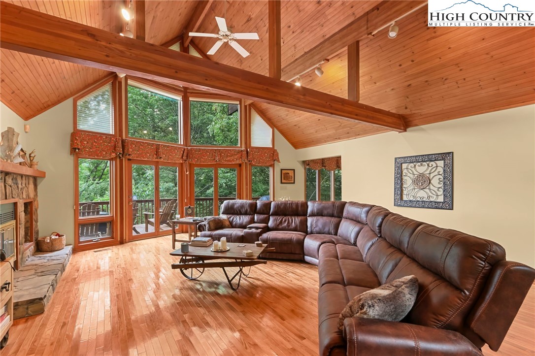 770 Grady Winkler Road Boone, NC 28607 - Photo 8 of 44 a living room with furniture and a large window