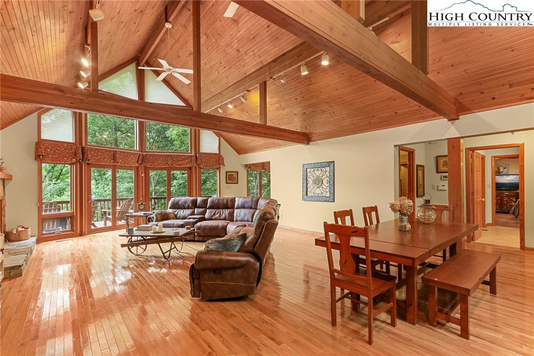 770 Grady Winkler Road Boone, NC 28607 - Photo 10 of 44 a living room with furniture and large windows