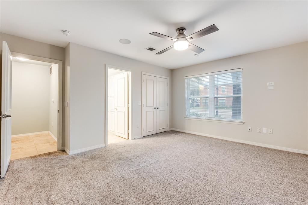2205 Canton Street, Unit 107 Dallas, TX 75201 - Photo 8 of 12 large downstaits secondary bedroom with en suite bathroom