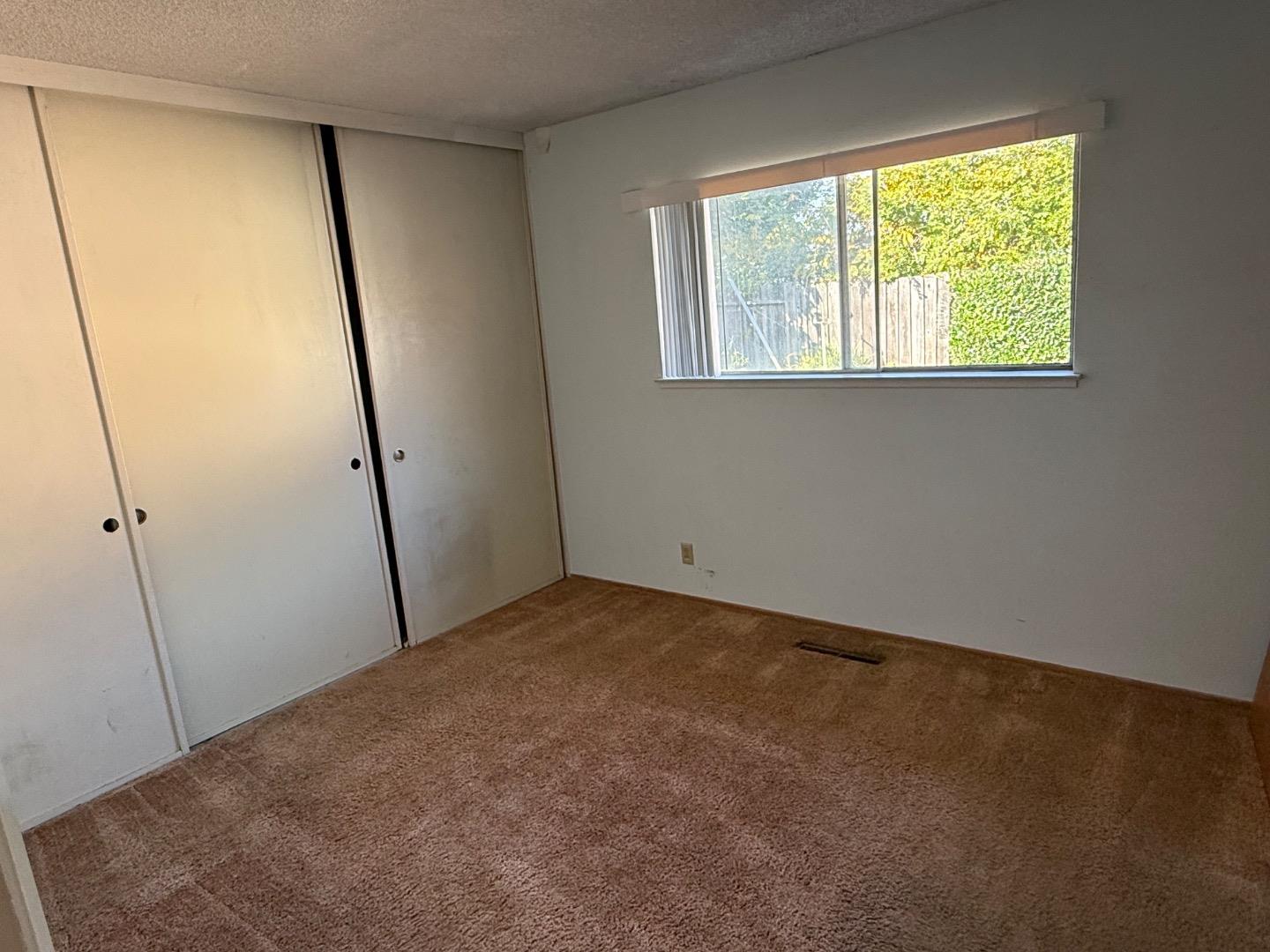 38809 Judie Way Fremont, CA 94536 - Photo 13 of 16 a view of an empty room with a window