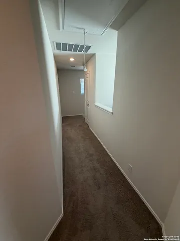 a view of a hallway with a small space