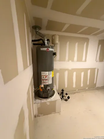 a view of an empty room with windows