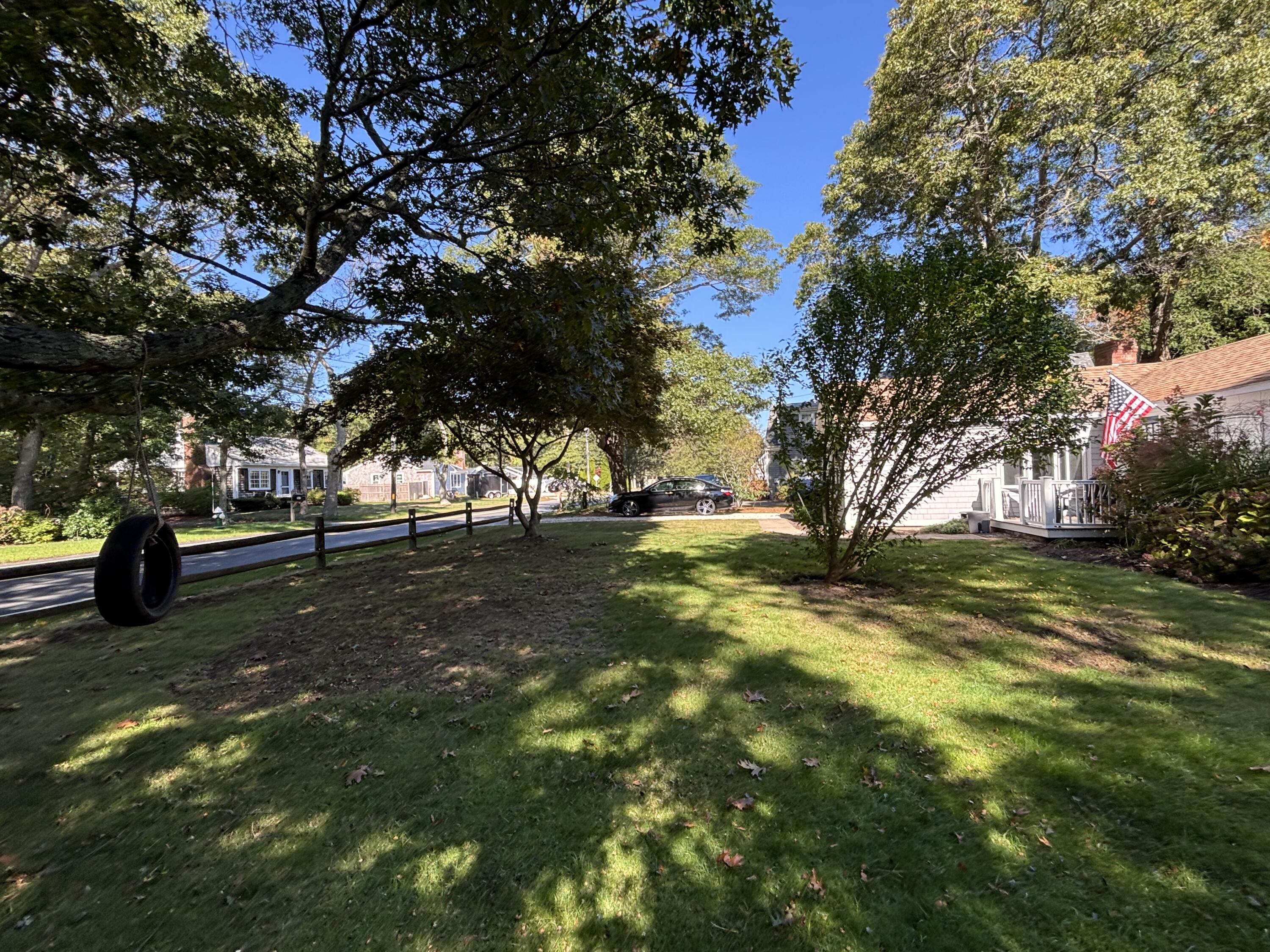 576 Strawberry Hill Road Centerville, MA 02632 - Photo 30 of 38 a view of yard with trees