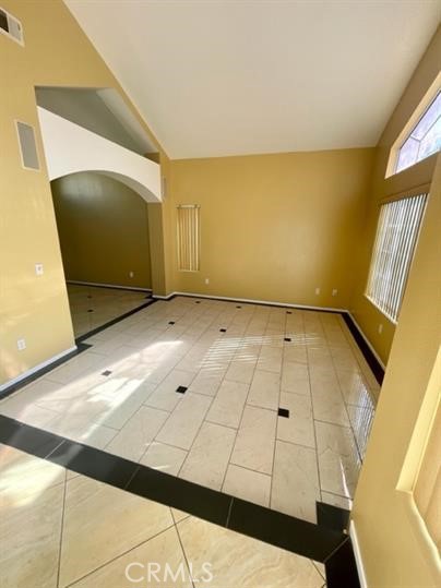 22710 Brompton Street Moreno Valley, CA 92553 - Photo 4 of 23 a view of an empty room with a window