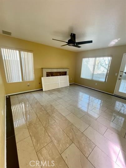 22710 Brompton Street Moreno Valley, CA 92553 - Photo 8 of 23 a view of an empty room and window