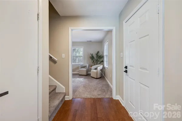 a view of a bedroom from a hallway