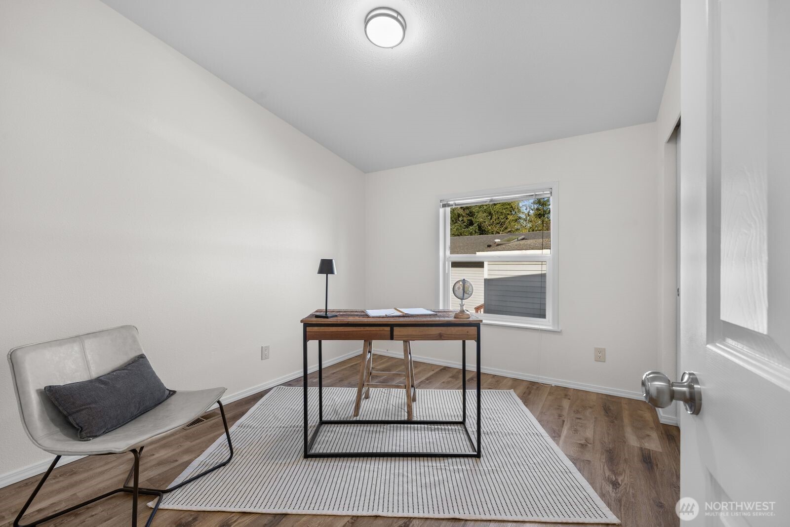 23825 15th Avenue Southeast, Unit 311 Bothell, WA 98021 - Photo 14 of 24 a view of a workspace with furniture and a window