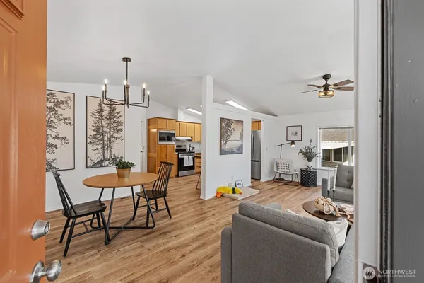 a living room with furniture and a table