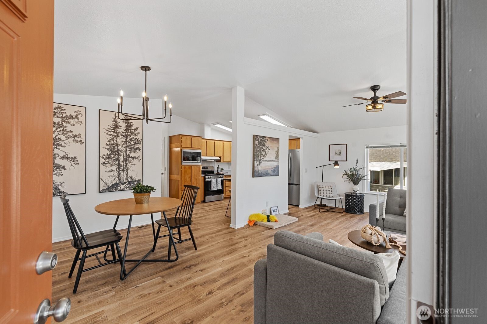 23825 15th Avenue Southeast, Unit 311 Bothell, WA 98021 - Photo 3 of 24 a living room with furniture and a table