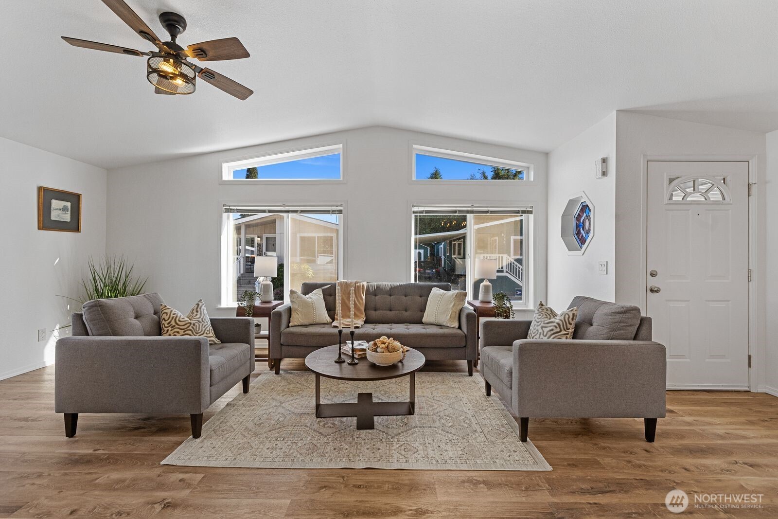 23825 15th Avenue Southeast, Unit 311 Bothell, WA 98021 - Photo 4 of 24 a living room with furniture and a large window
