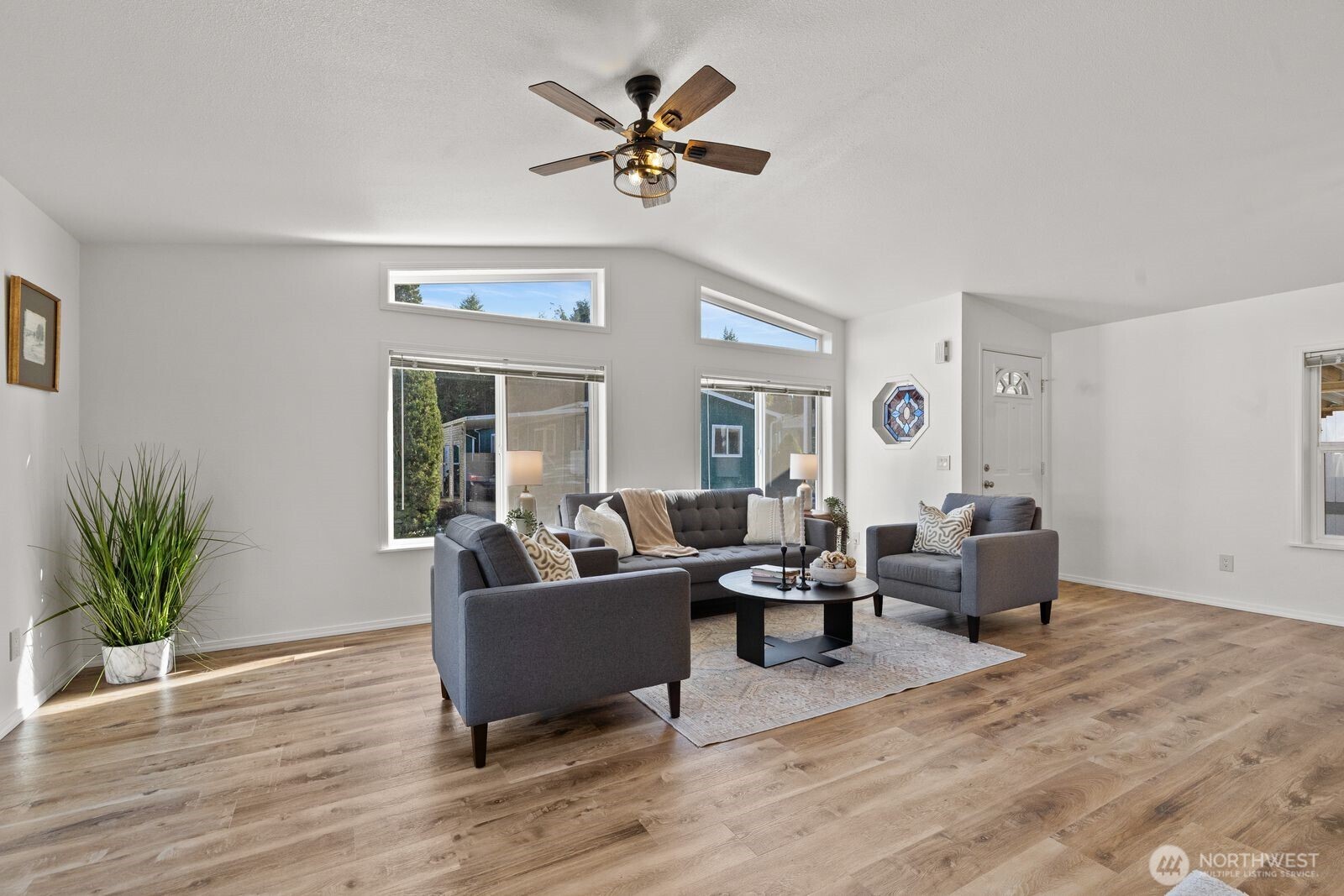 23825 15th Avenue Southeast, Unit 311 Bothell, WA 98021 - Photo 6 of 24 a living room with furniture and a large window