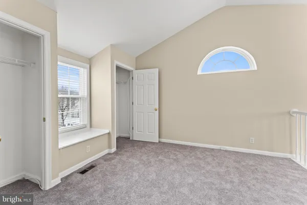a view of an empty room with window