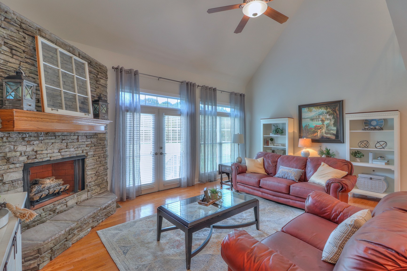 5009 Ash Hill Road Spring Hill, TN 37174 - Photo 10 of 56 a living room with furniture and a fireplace