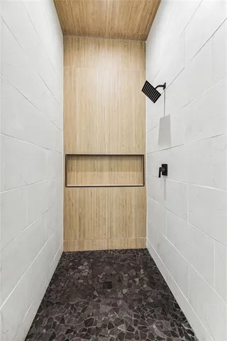 a white stove top oven sitting inside of a kitchen