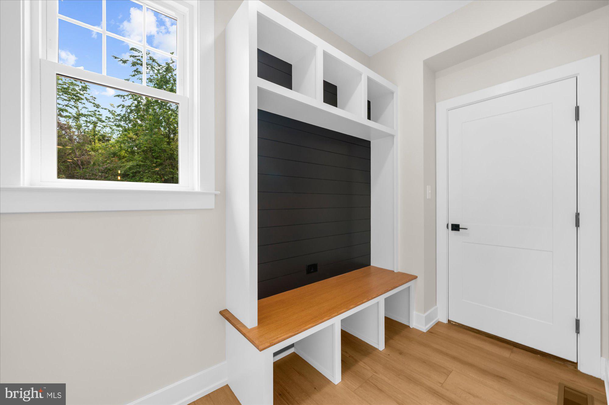 394 Renninger Road Perkiomenville, PA 18074 - Photo 22 of 41 a view of an empty room with wooden floor and a window