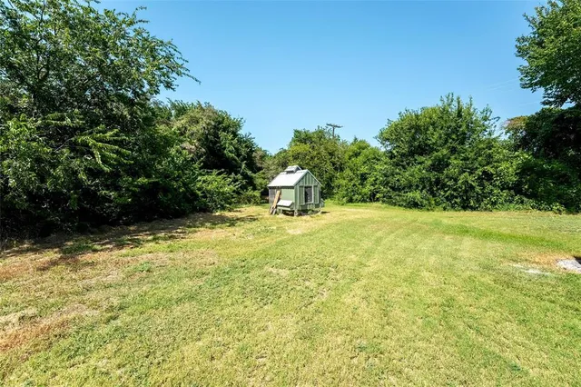 a fire hydrant in the middle of a field