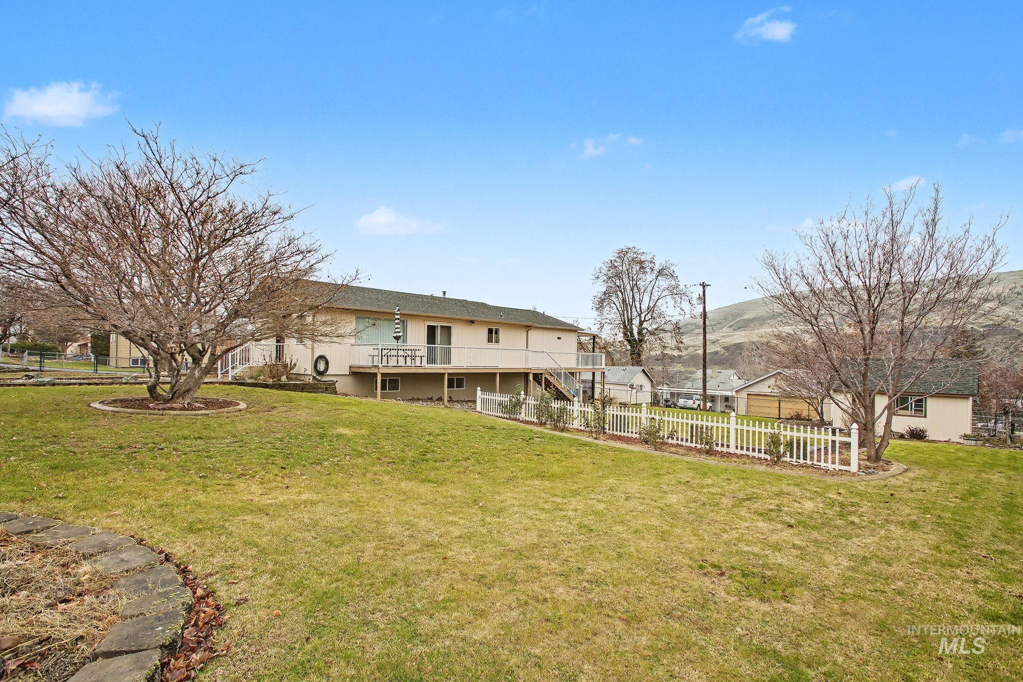 Rear view of house with stairway