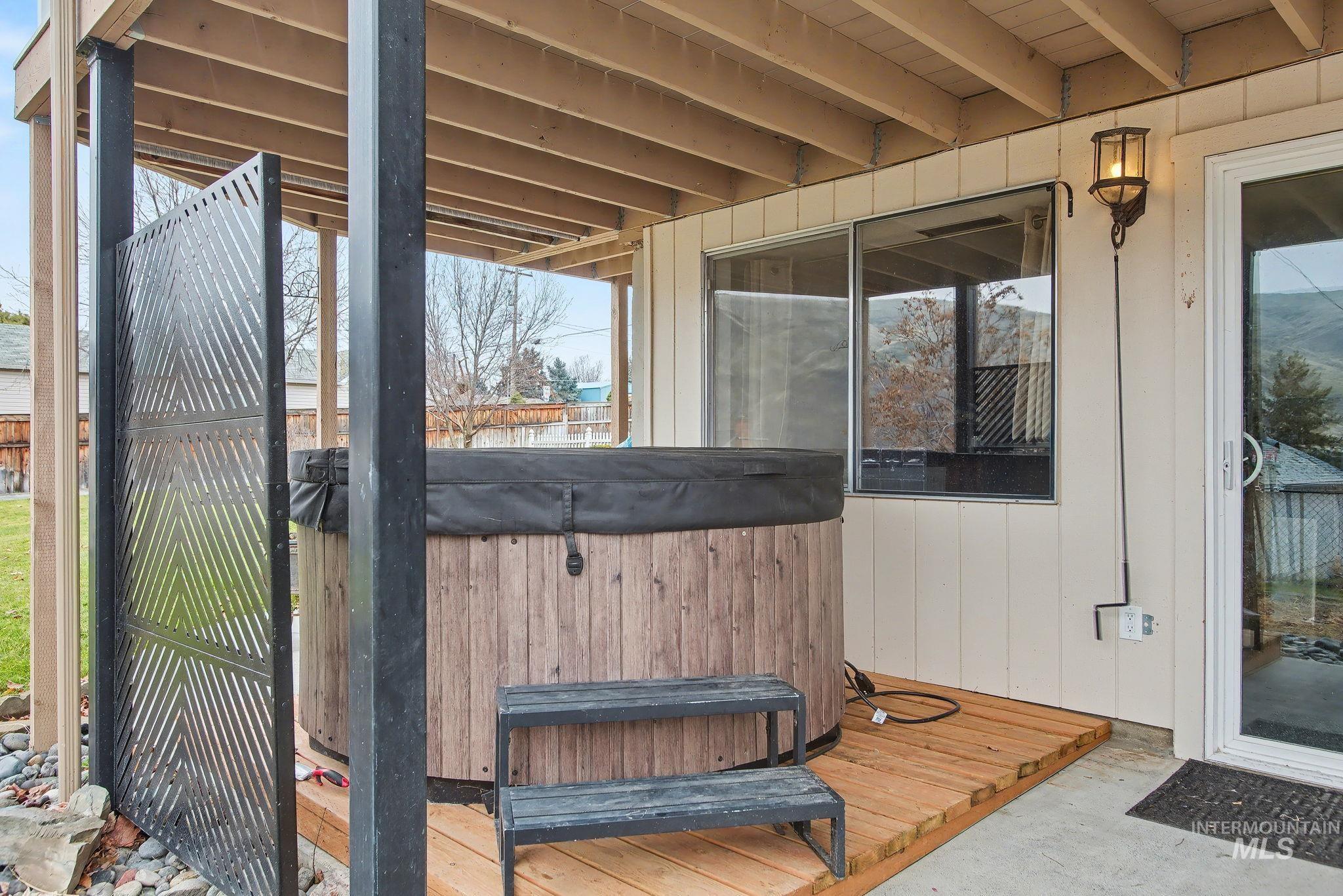 1103 3rd Street Asotin, WA 99402 - Photo 32 of 44 Wooden terrace featuring a hot tub