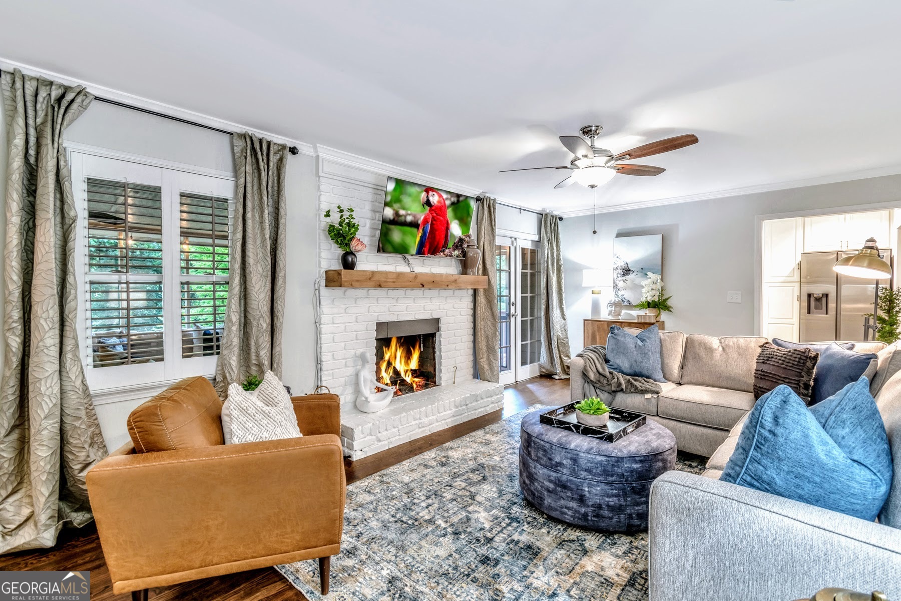 1897 Mt Vernon Road Dunwoody, GA 30338 - Photo 2 of 40 a living room with furniture fireplace and a large window