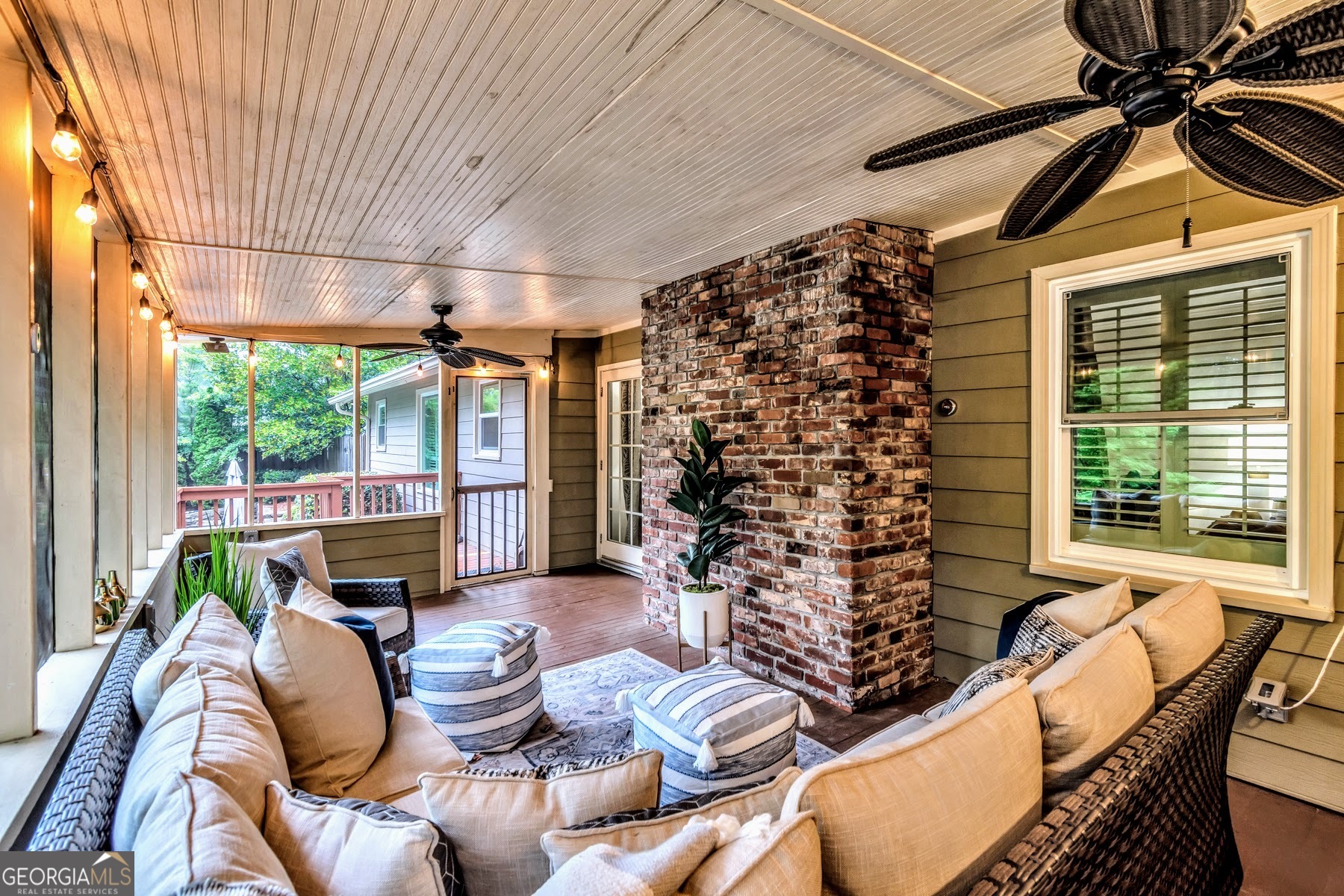 1897 Mt Vernon Road Dunwoody, GA 30338 - Photo 34 of 40 a living room with furniture and a large window