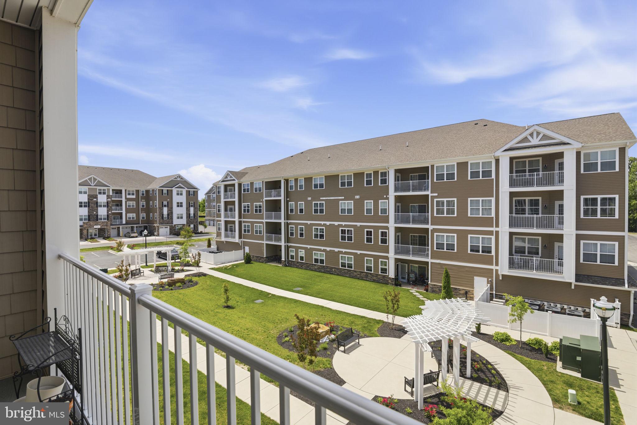 401 Bold Ruler Court, Unit 307 Havre de Grace, MD 21078 - Photo 30 of 32 Overlooking seating areas w/ trellises & community