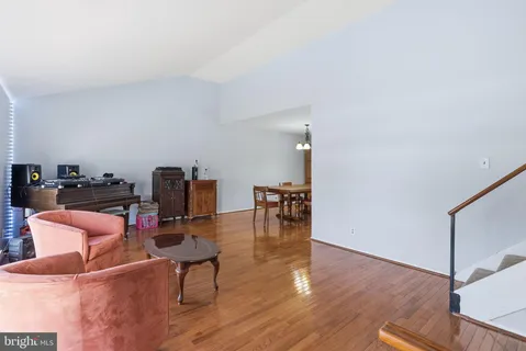 a workspace with furniture and wooden floor