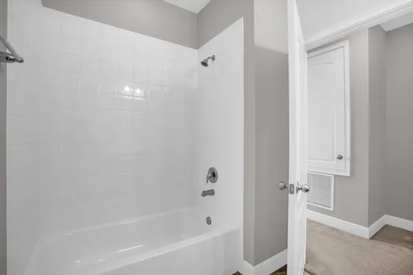 a bathroom with a bathtub