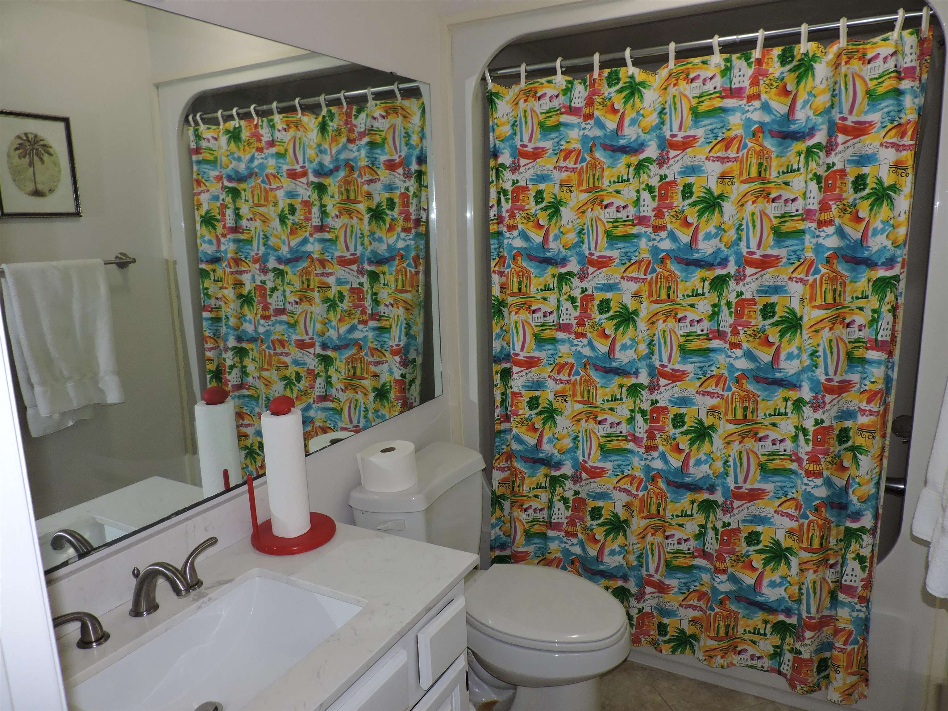 4396 Baldwin Avenue, Unit 80 Little River, SC 29566 - Photo 18 of 40 Full bathroom featuring vanity, tile patterned flooring, and shower / bath combo with shower curtain