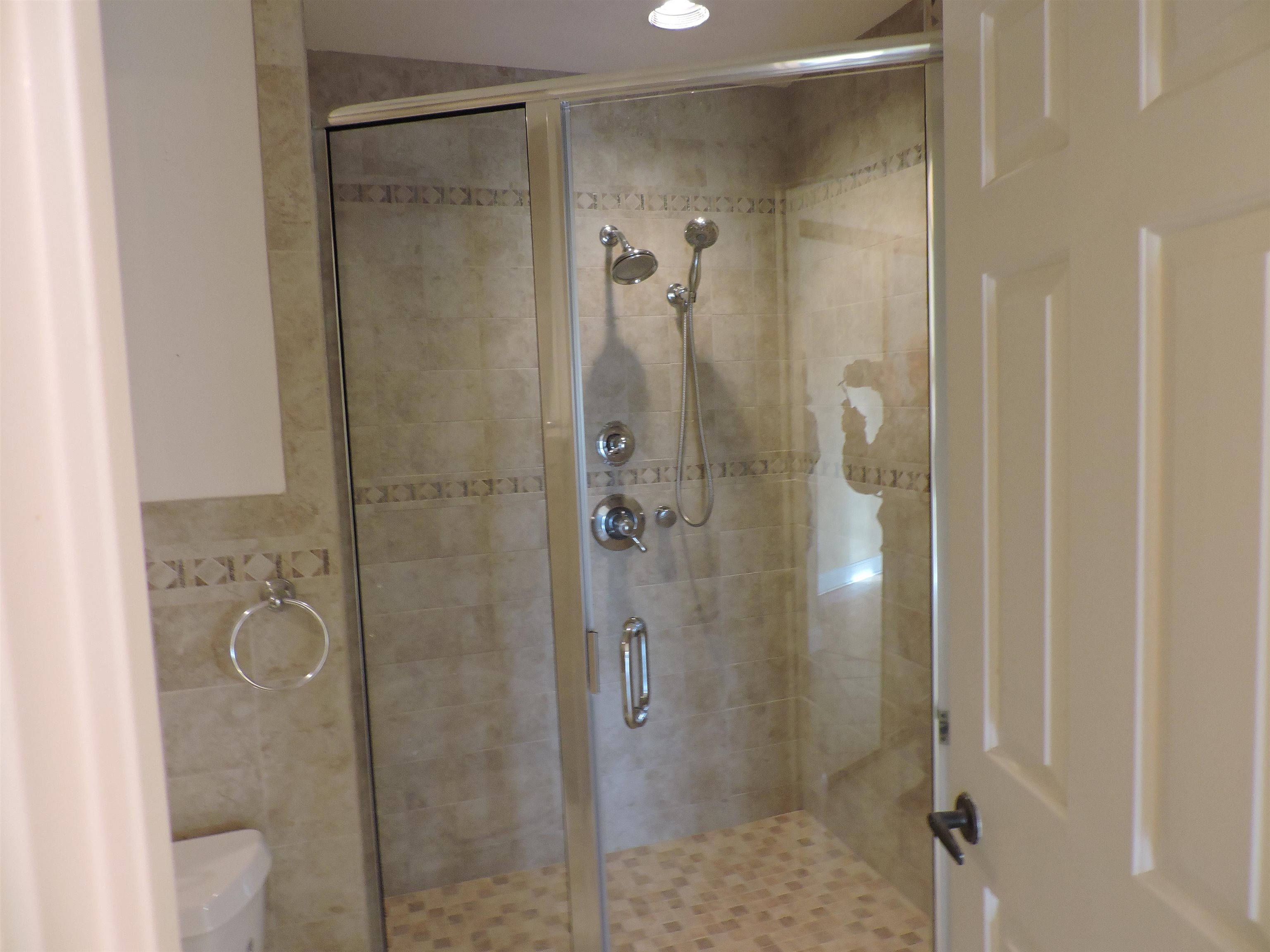 4396 Baldwin Avenue, Unit 80 Little River, SC 29566 - Photo 27 of 40 Bathroom featuring a shower stall and toilet