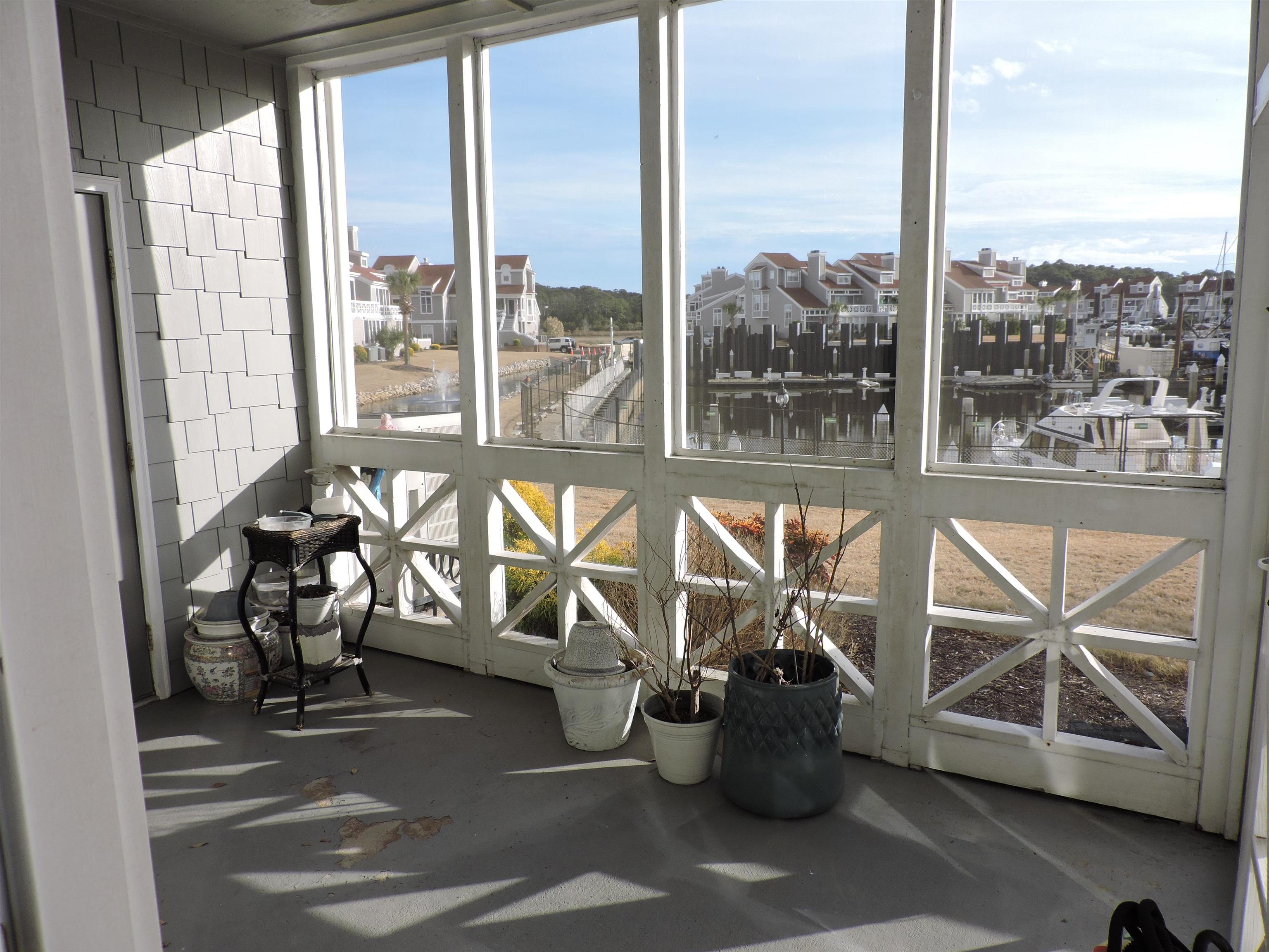 4396 Baldwin Avenue, Unit 80 Little River, SC 29566 - Photo 30 of 40 View of sunroom / solarium