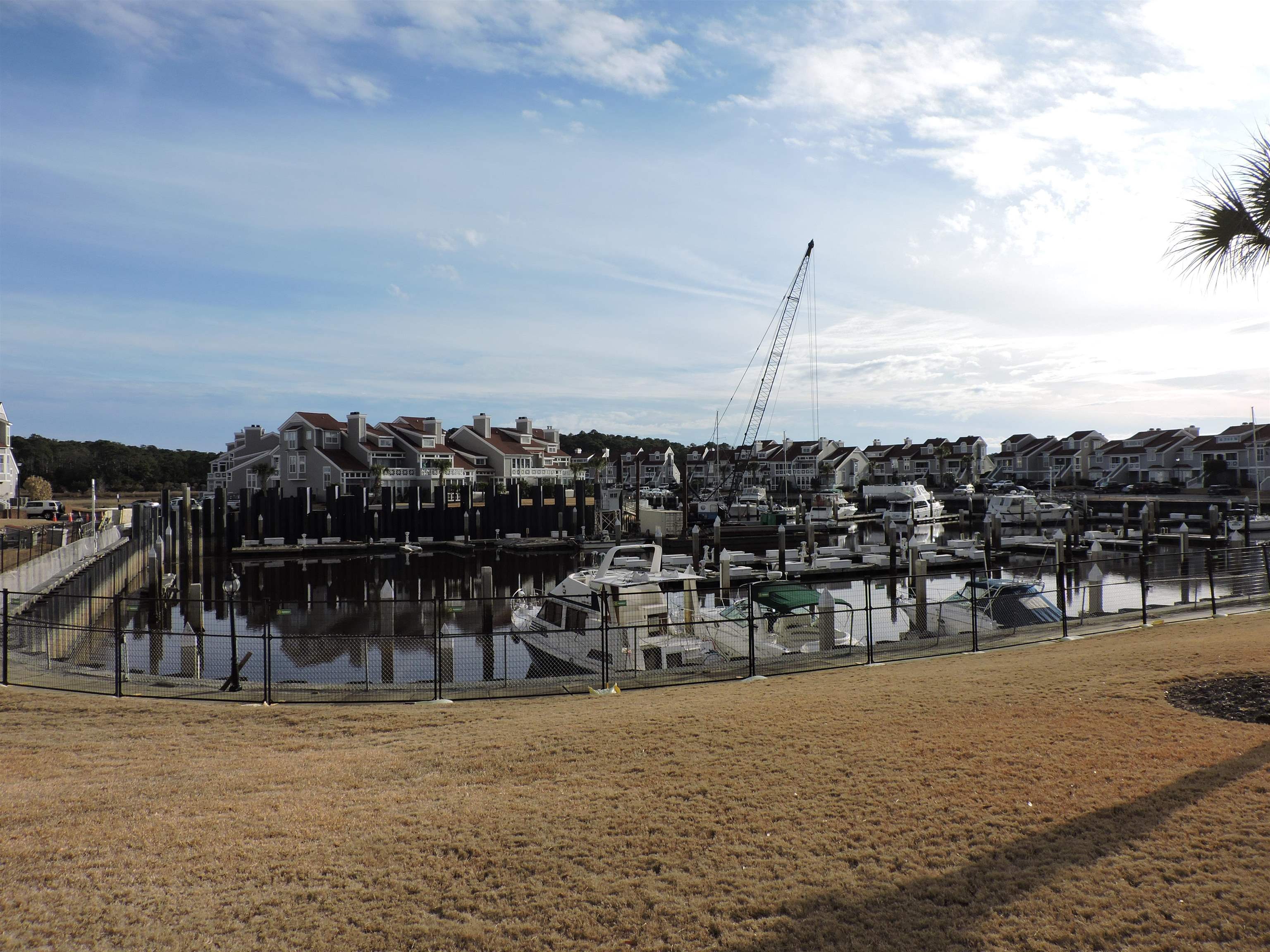 4396 Baldwin Avenue, Unit 80 Little River, SC 29566 - Photo 36 of 40 Dock featuring a lawn and a water view