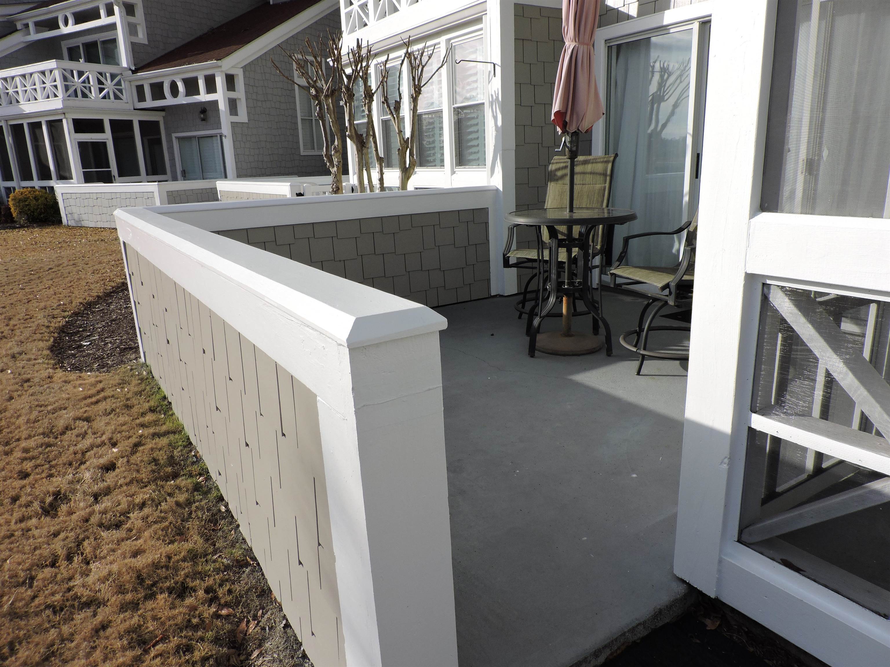 4396 Baldwin Avenue, Unit 80 Little River, SC 29566 - Photo 38 of 40 View of patio with a sunroom