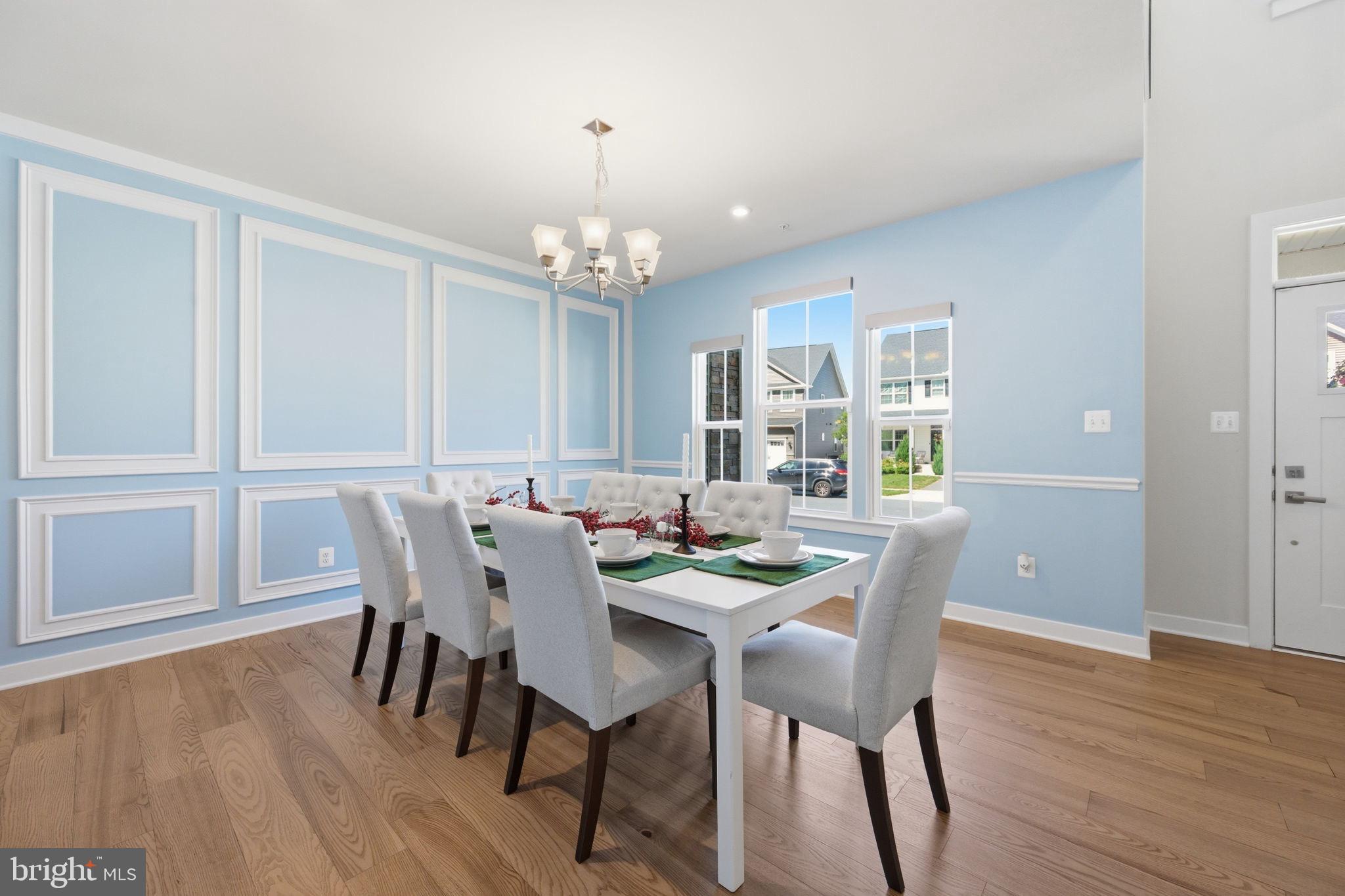 1321 Upper Patuxent Ridge Road Odenton, MD 21113 - Photo 11 of 48 Elegant dining space with blue accents.