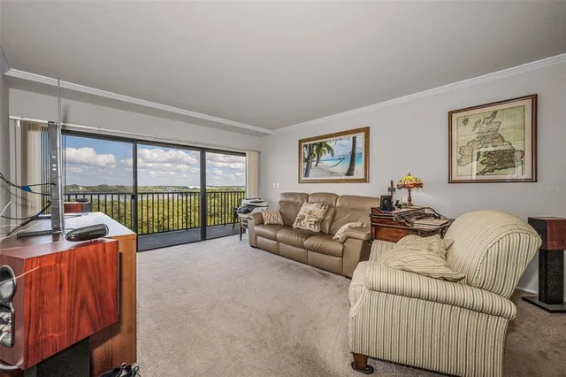 a view of a balcony with furniture